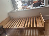 wood slatted twin bed frame, no mattress