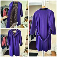 Coat front open showing patterned lining and 3-button closure