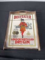 Top view of wooden tray with Beefeater Gin mirrored graphic