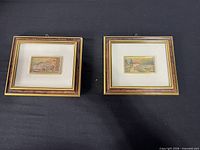 Both framed chromolithographs side by side