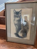 Framed drawing of cat showing full artwork and frame