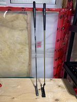 Full length view of both putters