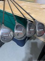 Club faces showing 848c Tour Classic driver, 3, 5, 7 woods