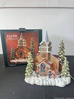 Church figure with box in background showing overall lot