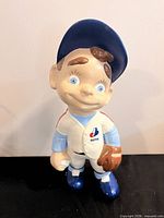 Front view of Montreal Expos ceramic statue