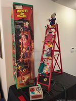 Full view of decoration beside original box and control box