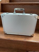 Closed silver aluminum briefcase