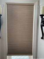 Blind installed and fully lowered in window frame