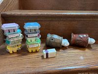 Entire lot showing two warmers, boxed bulb and stacks of wax melt bars