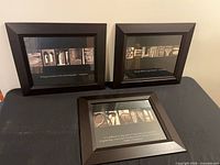 All three framed alphabet photography prints on display