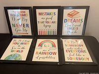Front view of all six framed prints