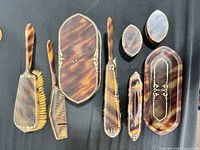 All eight vanity pieces laid out together