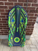 Front view showing graphics, side grip handles, and front tow grommet