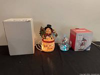Both lighted decorations with original boxes and power cords
