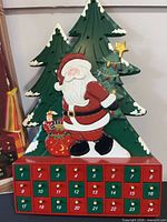 Front view of wooden Santa advent calendar