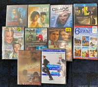 All ten sealed DVDs arranged face-up