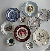 Front view showing all ten plates with various motifs