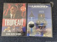 Front view of both sealed DVD cases showing titles and artwork