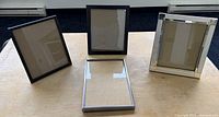 Front view of all four 8x10 frames arranged upright and flat
