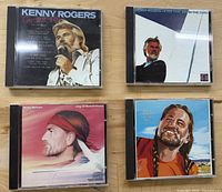 Front covers of all four CDs displayed