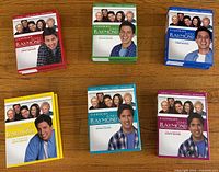 Six colour-coded Everybody Loves Raymond DVD season sets stacked