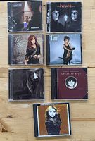 Front view showing all seven CD cases