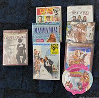 All eight DVD items laid out showing titles and packaging