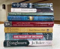 Stacked view of all eight book spines