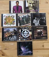 Front covers of nine CD cases