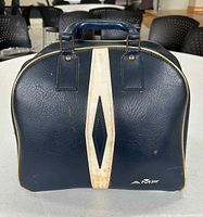 Front view of AMF navy bowling ball bag showing color, material, logo, wear
