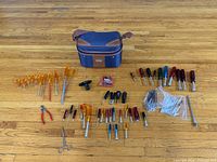 Full layout of all tools and carrying case on floor