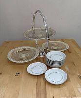 Cake stand opened with nine plates in front