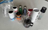 Full set of drinkware laid out on countertop