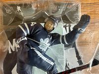 Close view of figure through plastic displaying uniform details