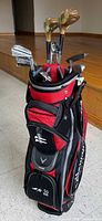 Full view of Callaway bag loaded with clubs, woods prominent