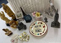 Group shot of all figurines, statues, plate, paperweight, trinket boxes and Thorley flower bouquet