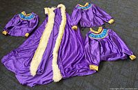 Purple cloak and three matching tunics