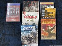 Group shot of all seven titles showing covers