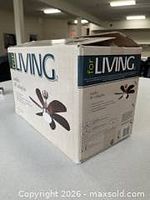 Factory-sealed box showing for LIVING Nordica branding and graphics