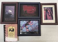 Front view of the four framed motivational cards and booklet
