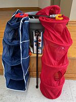 Group shot: planter, two hanging organizers, gripper on top, curtain rod, binder strips visible