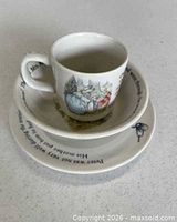 Cup stacked in bowl and plate showing overall set