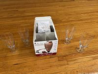 Box with four goblets displayed around it