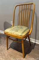 Front view of a single bentwood spindle back chair