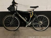 Full left-side view of the Specialized bike with accessories attached