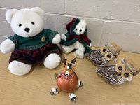 Group shot of both bears, skating reindeer ornament, two owl figurines
