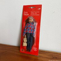 Front view of packaged Erna Meyer flexible doll and dog