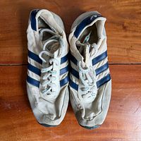 Top view of both shoes showing uppers, laces and stripe details