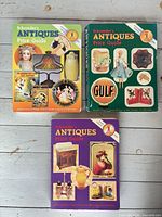 Front covers of all three Schroeder's Antiques Price Guide books