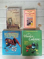 Group shot of four collectible guide books